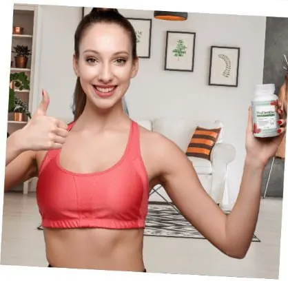 Seller promotional photo of a woman holding a ProDentim bottle
